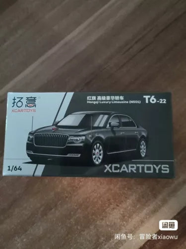 1:64 diecast luxury limousine model in box, dark gray, XCARTOYS branding