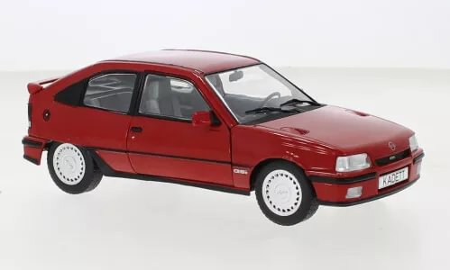 Red Opel Kadett E GSI 1985 diecast model car with whitewall wheels and front lights
