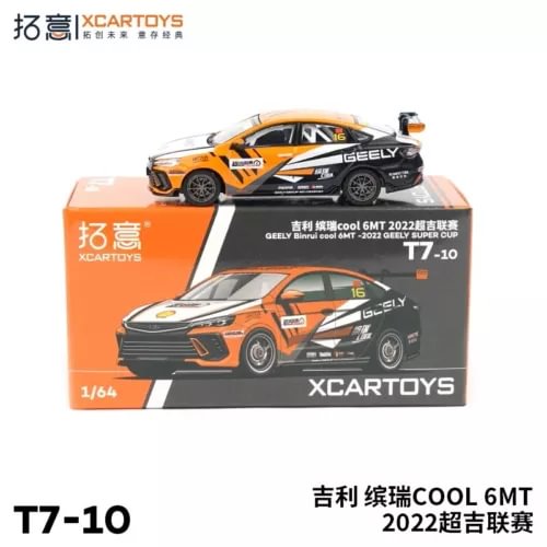 1:64 racing diecast model car with orange and black livery, front on box