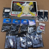 Mini quadcopter drone kit with yellow frame and multiple sealed electronic part bags