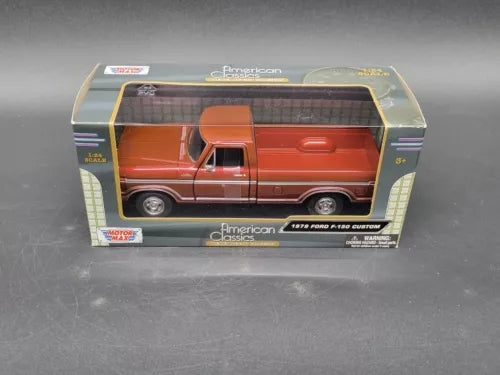 Orange 1979 Ford F-150 custom diecast pickup truck in retail box, 1:24