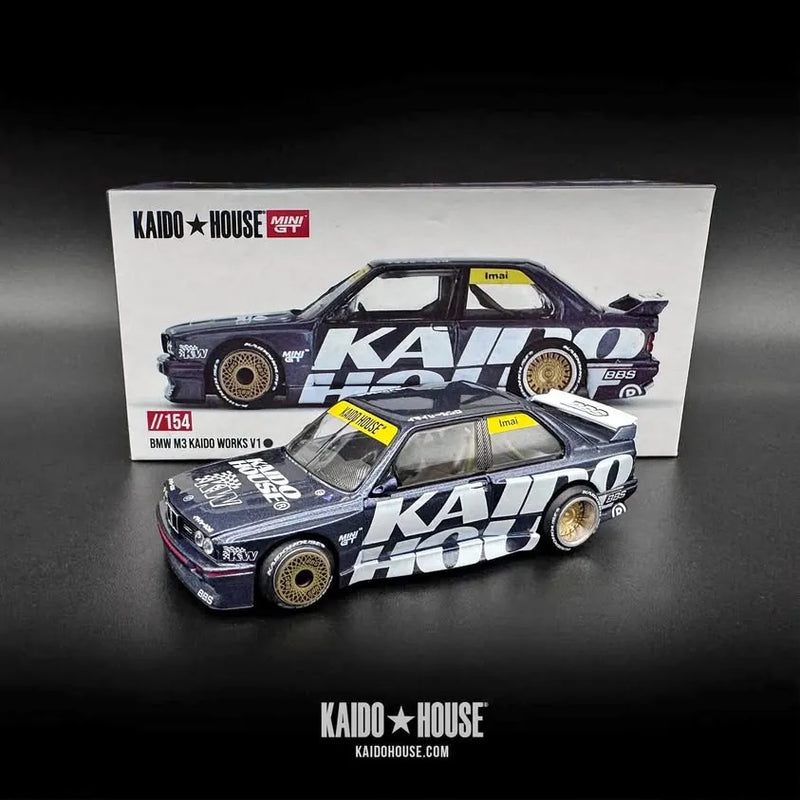 Diecast model car, dark blue BMW M3 E30 with white KAIDO House race graphics