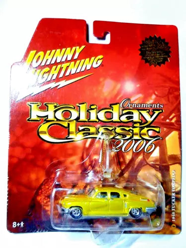 Johnny Lightning diecast Christmas tree ornament in blister, yellow car on red card