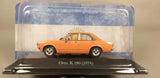 Orange 1974 Opel K 180 diecast model car in clear display case