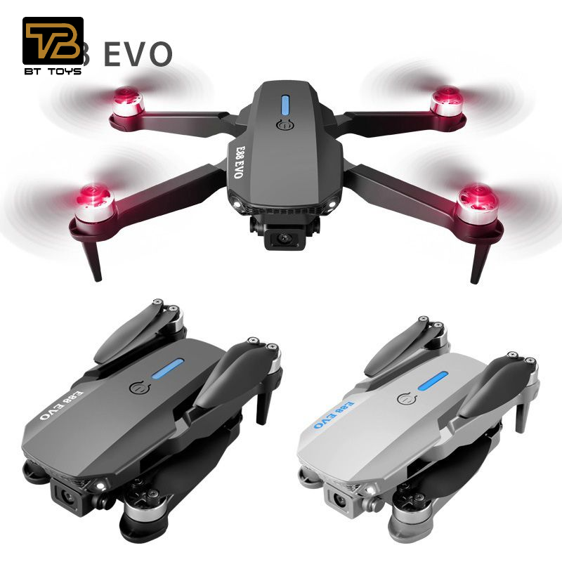 Foldable quadcopter drone with four propellers and front camera