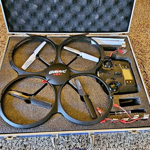Quadcopter drone kit in hard case with foam inserts and controller