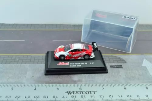 1:87 diecast racing car model with display base, red and white body, black stand