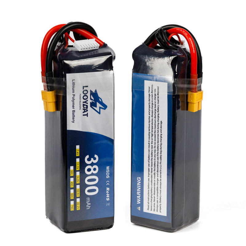 LiPo battery pack with red and black leads, silver label, and yellow connector tape