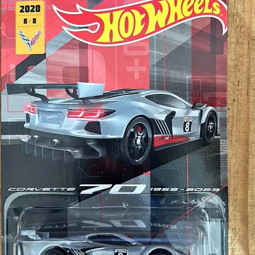 Hot Wheels 1/64 diecast Corvette C8.R model in display blister, blue-gray race car