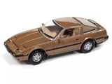 Brown diecast sports coupe car with black hood detail, 4-spoke wheels