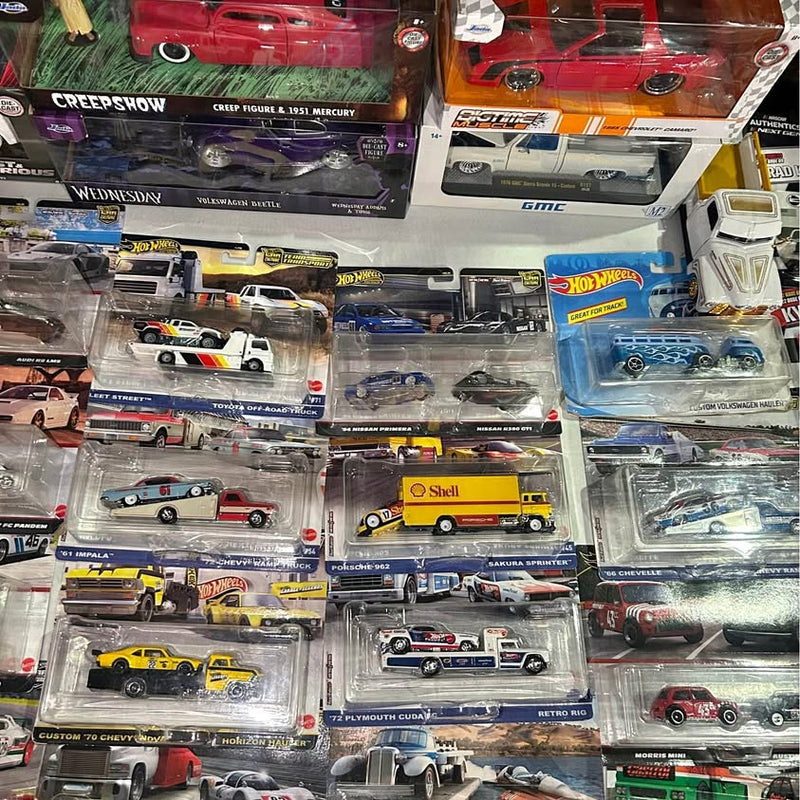 Assorted Hot Wheels diecast cars in clear blister packs