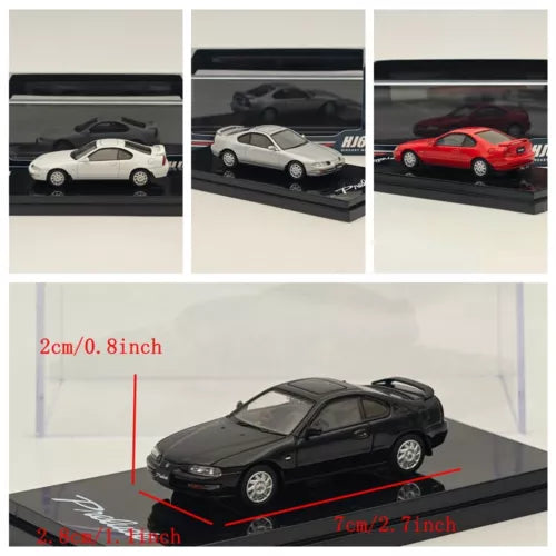 Black diecast model sedan on display base, front three-quarter view