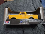 Yellow 1:24 diecast Ford Bronco pickup model by Motor Max in box