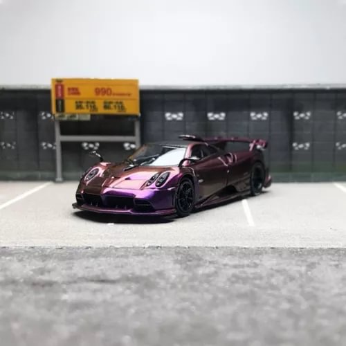 Purple sports diecast car model with open-wheel styling