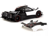 1/64 diecast model car of Pagani Zonda Cinque, white and black with red accents