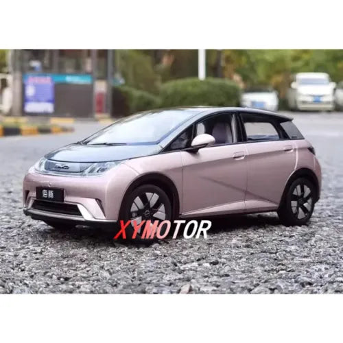 Diecast model car of BYD Dolphin 2021 electric, light pink, front 3/4 view