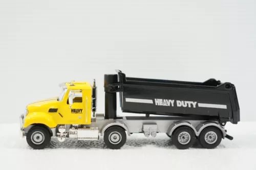Yellow and black diecast dump truck with heavy-duty dump bed, side view