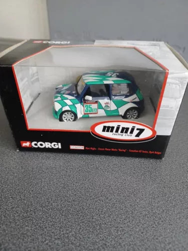 Corgi 1:36 scale diecast race car in box, teal with checkered stripe and number 35