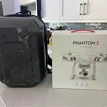 DJI Phantom 3 drone in hard transport case, with retail box included