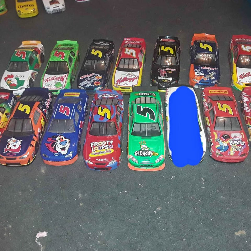 Assorted NASCAR 1:24 diecast race cars with team logos, front views