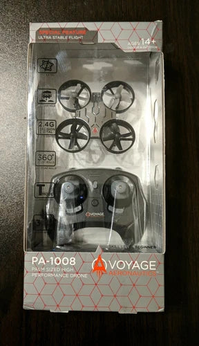 Palm-size high-performance drone in retail box, showing four propellers, silver