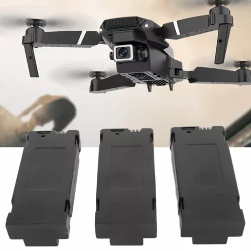 Three black rectangular drone battery packs with mounting tabs