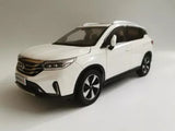 White diecast SUV model car with black wheels, front three-quarter view