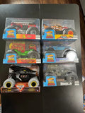 1/24 Monster Jam Hot Wheels diecast truck set in retail display boxes