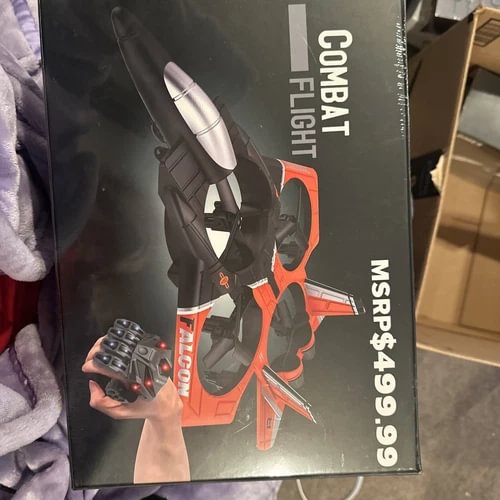 RC drone box with orange illustrated drone and controller details