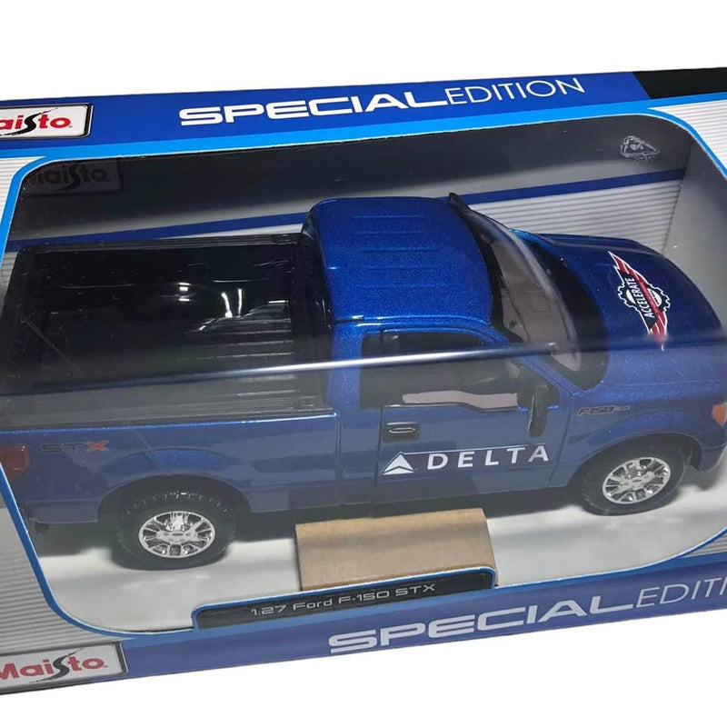 Blue diecast Ford F-150 model truck with Delta Air Lines logo and red emblem