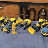 Yellow John Deere construction diecast vehicles set, 1:50 scale, with trucks and excavator