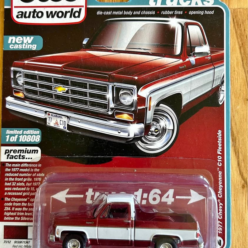 Red 1:64 diecast pickup truck in clear blister packaging