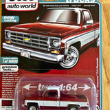 Red 1:64 diecast pickup truck in clear blister packaging