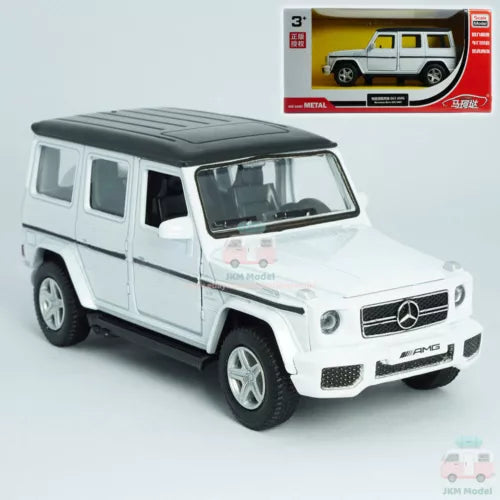 White Mercedes-Benz G63 AMG diecast model car with detailed wheels, front 3/4 view