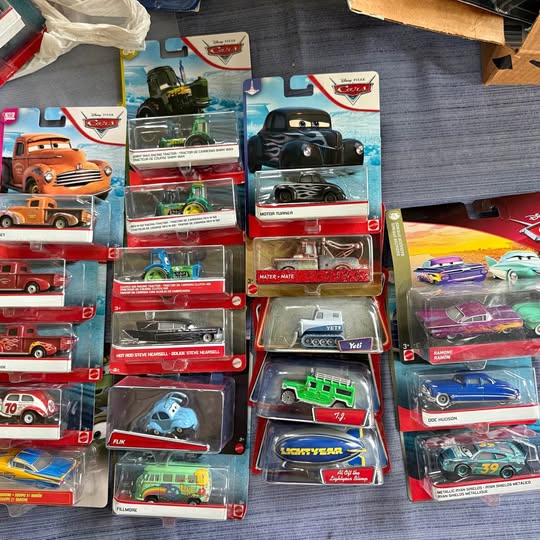 Disney Pixar Cars diecast blister packs with assorted small vehicles