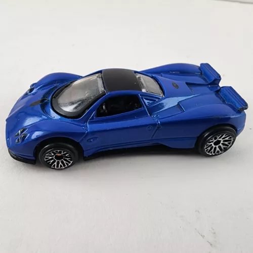 Blue diecast toy sports car, side view with black roof and wheels