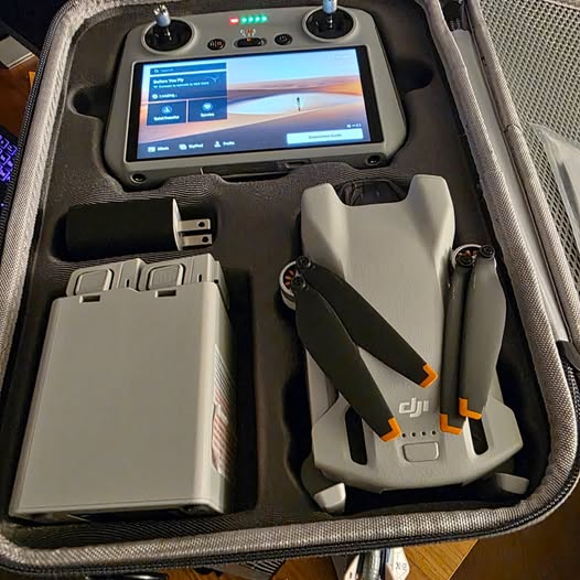 DJI Mini 3 Fly More Combo drone kit with controller, folding drone and extra battery