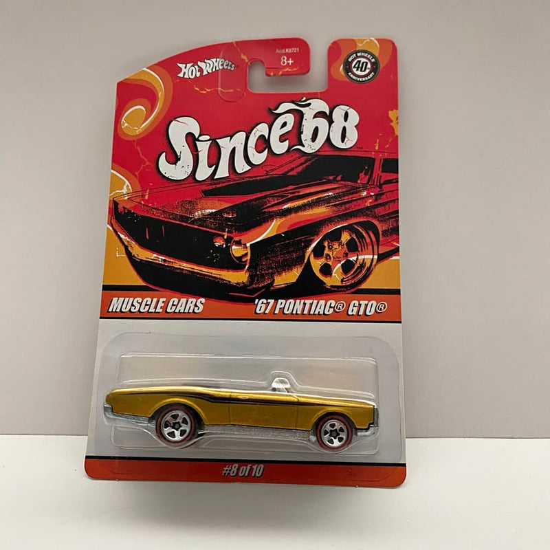 Yellow gold 1967 Pontiac GTO Hot Wheels diecast toy car in blister pack