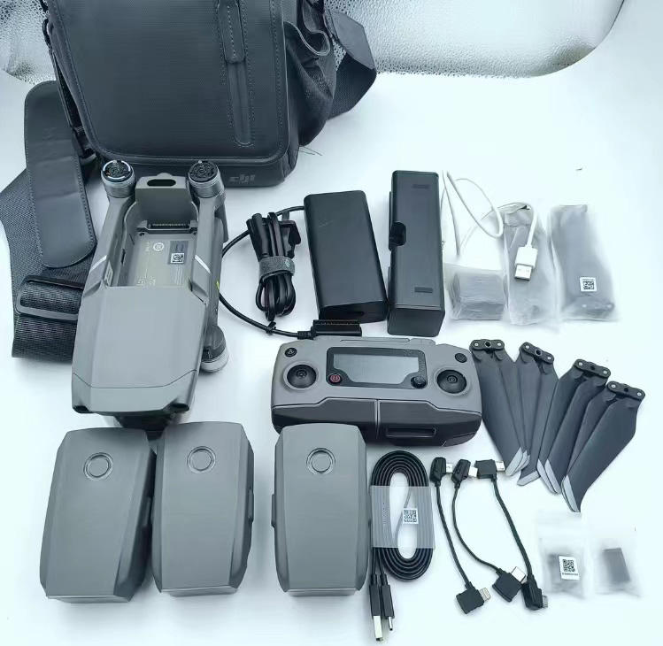 Used Mavic 2 Pro quadcopter drone kit with controller, batteries, propellers, and cables
