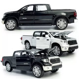 1:36 diecast Toyota pickup truck toy set, black and white with open doors