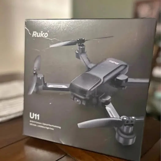 Ruko U11s drone with foldable propellers on product box