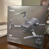 Ruko U11s drone with foldable propellers on product box