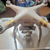 DJI Phantom 3 4K drone with front camera gimbal and gold motor rings