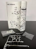 Diecast model kit sprues and parts with instruction sheet, grey metal pieces
