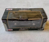 Black 1940 Ford pickup diecast model car in retail display box