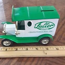 Green die-cast bank truck with circular door and “Little” logo on side