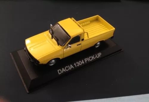 Yellow DACIA 1304 pickup diecast model with open bed, 1:43 scale