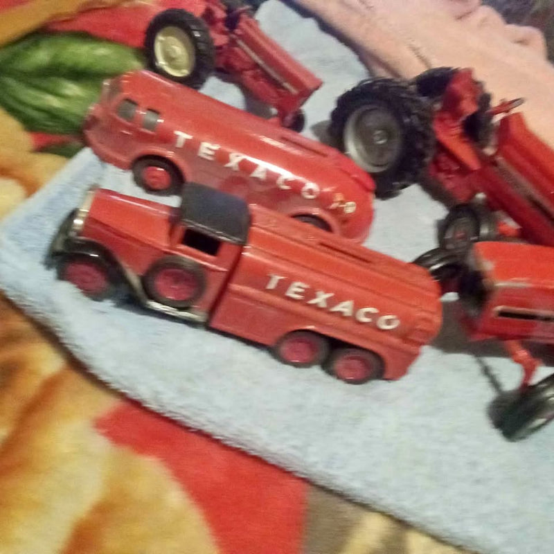 Vintage red Texaco diecast truck with black wheels and TEXACO lettering