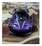 Purple alloy racing car model diecast, front view with black grille and headlights
