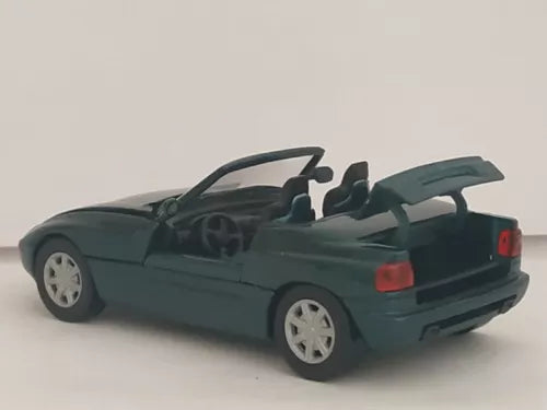 BMW Z1 open-top diecast scale car, dark green with white wheels